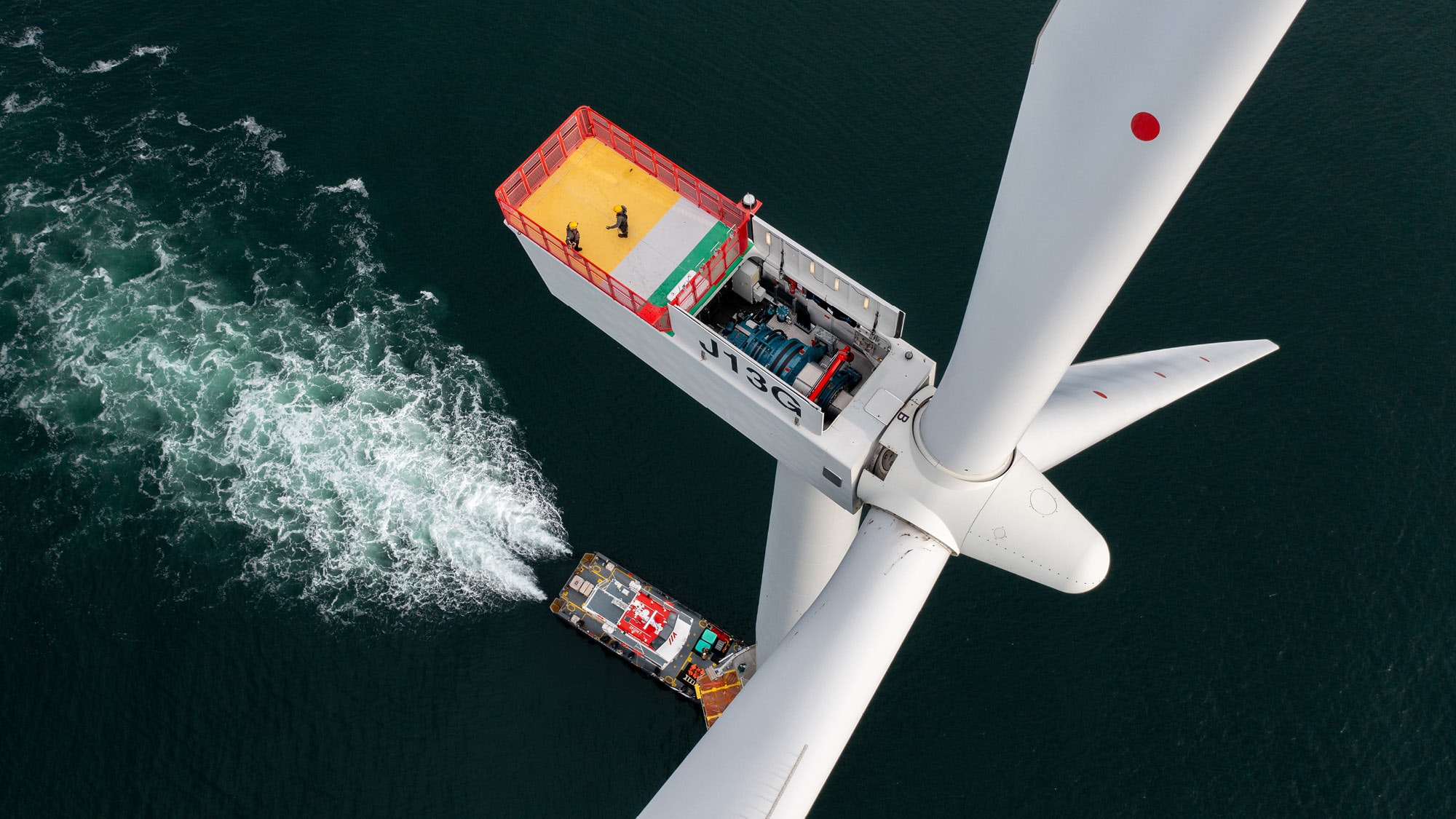 Photo of a wind turbine from above.